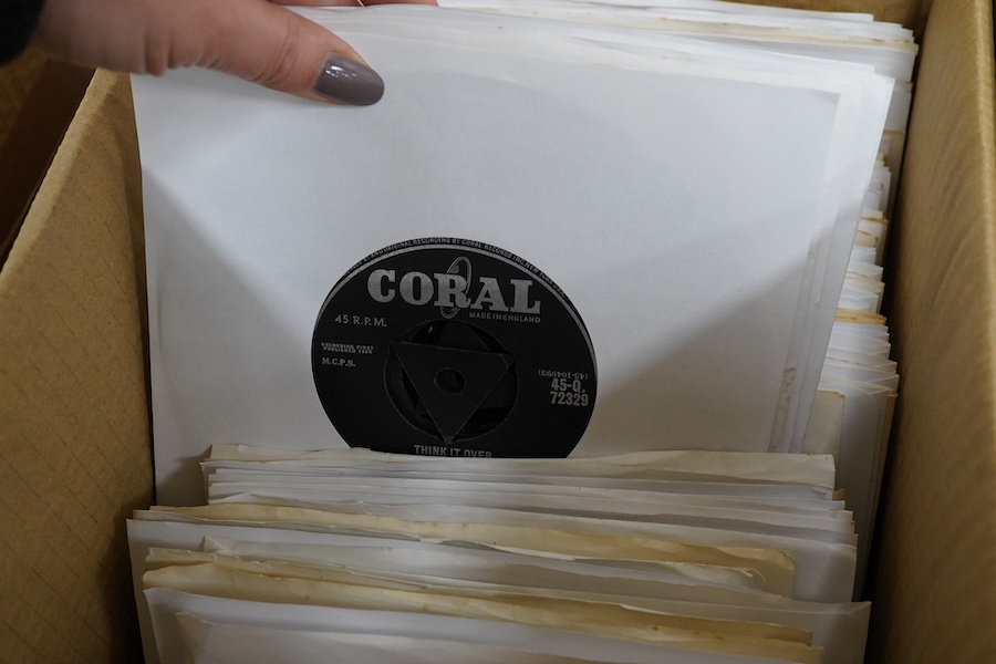 Four boxes of 7 inch singles, labels include; Coral, Parlophone, RCA, HMV, Columbia, etc. artists include; Dolly Parton, Gene Simmons, Alice Cooper, Ultravox, Motorhead, Dr. Feelgood, Buddy Holly, the Crickets, Manfred M